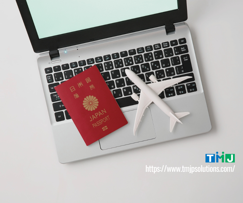 Laptop keyboard with a Japanese passport and airplane model, symbolizing Business English as a passport to global professional opportunities.
