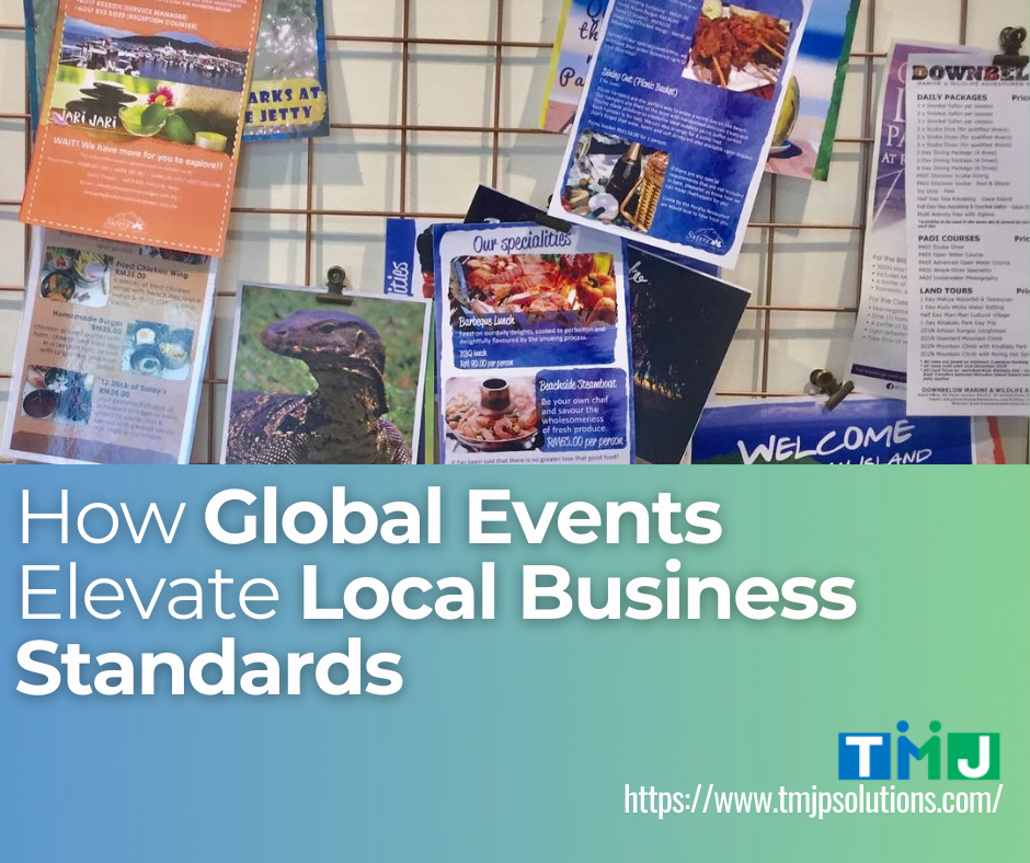 A bulletin board filled with colorful flyers promoting local attractions, food specials, diving courses, and wildlife tourism, with a banner at the bottom reading “How Global Events Elevate Local Business Standards” alongside the TMJ logo.
