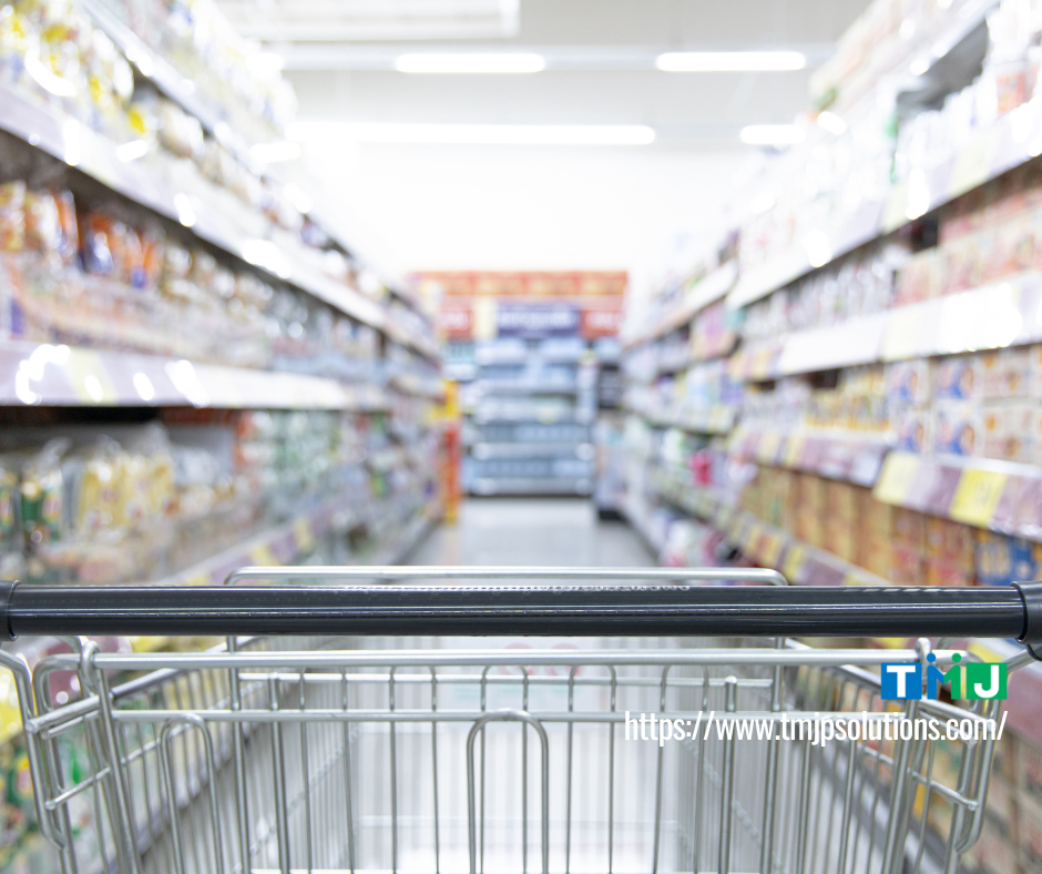 View from behind a shopping cart in a grocery aisle, symbolizing consumer choice and the importance of rights protection in modern business.