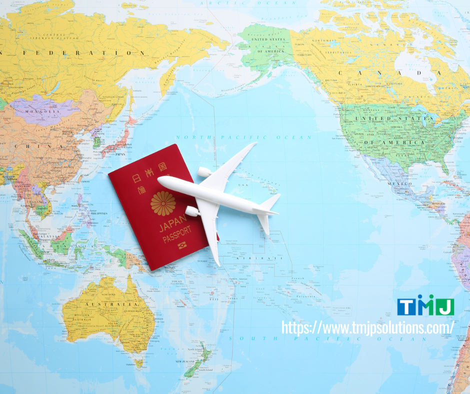 A Japanese passport and a plane scale model above the world map